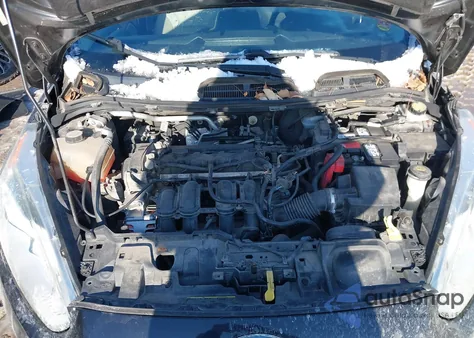 2014 Ford Fiesta Titanium z USA, uszkodzony, nr VIN 3FADP4CJ4EM107071